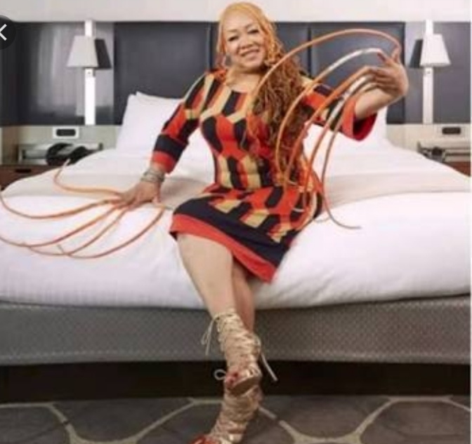 Woman With World's Longest Nails Has Them Cut After Nearly 3 Decades